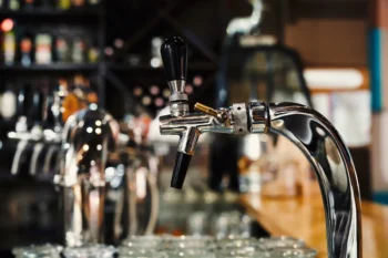 Selective focus of modern beer taps in pub 2023 11 27 05 37 17 utc